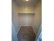 Walk-in closet features neutral paint color, updated flooring, and a standard rod for storage at 100 Lexington Pl, Goose Creek, SC 29445