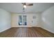 Bright living room with hardwood floors, white walls, and lots of natural light at 103 Four Iron Dr, Summerville, SC 29483