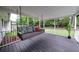 Relax on the porch swing and enjoy the view at 103 Four Iron Dr, Summerville, SC 29483