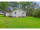 Well-maintained lawn complements house in backyard at 106 N Pine St, Summerville, SC 29483