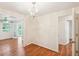 This dining room is centrally located and provides access to many other rooms of the house at 106 N Pine St, Summerville, SC 29483