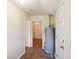 Hallway leading to room with chandelier, features water heater at 106 N Pine St, Summerville, SC 29483