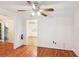 The living room features hardwood floors and a view into the kitchen at 106 N Pine St, Summerville, SC 29483