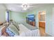 Bright main bedroom with carpet floors, ceiling fan, and attached bathroom at 108 Hemingway Cir, Summerville, SC 29483