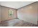Bright bedroom with wood flooring, a window view, and ample space at 108 Swanson Dr, Summerville, SC 29483