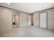 Spacious bedroom with plush carpet, multiple doorways and bright recessed lighting at 108 Swanson Dr, Summerville, SC 29483