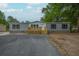 Charming single-story home with a new deck and fresh gravel driveway at 108 Swanson Dr, Summerville, SC 29483