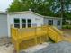 A new deck and stairs adds to the charm of this home at 108 Swanson Dr, Summerville, SC 29483