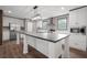 Spacious kitchen showcasing a large center island, modern lighting, and ample counter space at 108 Swanson Dr, Summerville, SC 29483