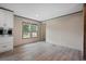 Living area boasting hardwood floors and built-in cabinets, illuminated by natural light at 108 Swanson Dr, Summerville, SC 29483