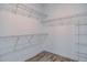 Walk-in closet includes wire shelving and luxury vinyl plank flooring at 116 Crosscut Ln, Summerville, SC 29486