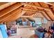 Unfinished attic storage space with exposed beams at 117 Ponderosa Rd, Summerville, SC 29483