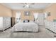 Bright primary bedroom with carpet flooring, a ceiling fan, and neutral colored walls at 117 Ponderosa Rd, Summerville, SC 29483