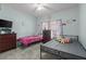 Bedroom featuring two beds with colorful decor and carpeted flooring at 117 Ponderosa Rd, Summerville, SC 29483