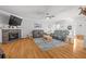 Inviting living room featuring hardwood floors, a fireplace, and comfortable seating at 117 Ponderosa Rd, Summerville, SC 29483