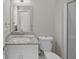 Bathroom with white cabinets, granite countertop, toilet and shower at 125 Ridge Rd, Summerville, SC 29485