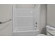 Clean bathroom featuring a white tub with a shower and a modern toilet at 125 Ridge Rd, Summerville, SC 29485