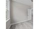 Clean bedroom features gray vinyl flooring, a window and neutral walls at 125 Ridge Rd, Summerville, SC 29485