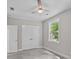Bedroom features include gray flooring, natural light, and a ceiling fan at 125 Ridge Rd, Summerville, SC 29485