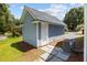 Exterior view of the home's outbuilding, showcasing its clean design and well-maintained exterior at 125 Ridge Rd, Summerville, SC 29485