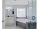Relaxing bathroom showcases a soaking tub and a glass-enclosed shower at 1250 White Tail Path, Charleston, SC 29414