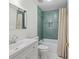 Bathroom with subway tile, shower, tub and white sink vanity with chrome hardware at 1250 White Tail Path, Charleston, SC 29414