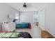bedroom with light hardwood floors, closet, ceiling fan, and whimsical dinosaur themed decor at 1250 White Tail Path, Charleston, SC 29414