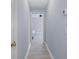 Hallway view leading to bright bedroom with ceiling fan and light gray paint at 1250 White Tail Path, Charleston, SC 29414