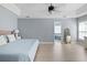 Spacious main bedroom with ceiling fan and ensuite bathroom access at 1250 White Tail Path, Charleston, SC 29414