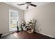 Bedroom with ceiling fan, hardwood floors, large window, and ample space at 130 Shropshire St, Goose Creek, SC 29445