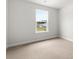Cozy bedroom featuring plush carpeting, a neutral color palette, and a bright window at 133 Brant Dr, Summerville, SC 29483