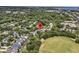 Aerial view featuring the neighborhood with scenic views of a pond, lush trees, and a green sports field at 134 Etiwan Park St, Charleston, SC 29492