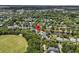 Stunning aerial view of a beautiful neighborhood surrounded by lush trees and a tranquil pond at 134 Etiwan Park St, Charleston, SC 29492