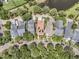 Aerial view of a neighborhood showcasing well-maintained homes, tree-lined streets, and proximity to green spaces at 134 Etiwan Park St, Charleston, SC 29492