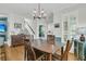 Elegant dining room with hardwood floors, modern lighting, and comfortable seating, perfect for gatherings at 134 Etiwan Park St, Charleston, SC 29492