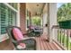 Relaxing front porch with comfortable seating, perfect for enjoying the outdoors and lush surroundings at 134 Etiwan Park St, Charleston, SC 29492