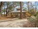 Charming wooden gazebo surrounded by trees, providing a shaded spot for relaxation and gatherings in the park at 134 Etiwan Park St, Charleston, SC 29492