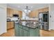 Spacious kitchen featuring a central island, stainless steel appliances, and ample cabinet space at 134 Etiwan Park St, Charleston, SC 29492