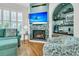 Inviting living room featuring a fireplace, hardwood floors, and stylish accents and decor at 134 Etiwan Park St, Charleston, SC 29492