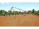 Community playground with swings offers a fun outdoor activity for residents at 134 Etiwan Park St, Charleston, SC 29492
