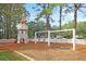 Charming playground with a tower, swings, and fenced perimeter for safety at 134 Etiwan Park St, Charleston, SC 29492