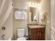 Small bathroom with a single vanity, toilet, and a shower tub with a curtain at 1454 Carradale Ln, Mount Pleasant, SC 29466