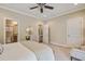 Bedroom with a beige color palette, and doorways leading to the bathroom and stairway at 1454 Carradale Ln, Mount Pleasant, SC 29466