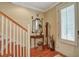 Inviting entryway with hardwood floors, a decorative mirror, and convenient coat rack at 1454 Carradale Ln, Mount Pleasant, SC 29466