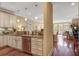 Modern kitchen showcasing stainless steel appliances, granite countertops, and custom cabinetry at 1454 Carradale Ln, Mount Pleasant, SC 29466