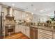Well-equipped kitchen featuring stainless steel appliances, granite countertops, and ample cabinet space at 1454 Carradale Ln, Mount Pleasant, SC 29466