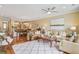 Open-concept living room with hardwood floors, comfortable seating, and a seamless flow to the kitchen at 1454 Carradale Ln, Mount Pleasant, SC 29466