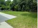 Well-maintained backyard featuring a large grassy area, wood fence, and ample space at 164 Historic Dr, Mount Pleasant, SC 29464