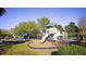 Community playground featuring swings, slides, and climbing structure for to enjoy outdoors at 164 Historic Dr, Mount Pleasant, SC 29464