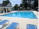 Large community pool with lounge chairs, perfect for relaxation and recreation at 164 Historic Dr, Mount Pleasant, SC 29464